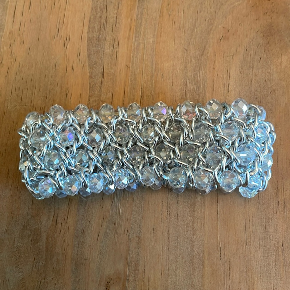 Silver beaded bracelet 1.25” wide.